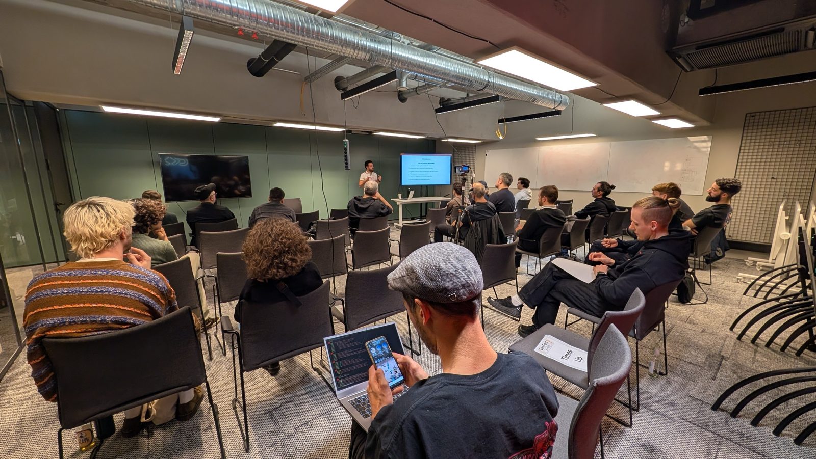 Speaker presenting to a full talk room